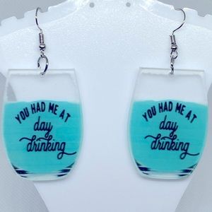 Drink shaped dangling earrings. “You had me at day drinking “.